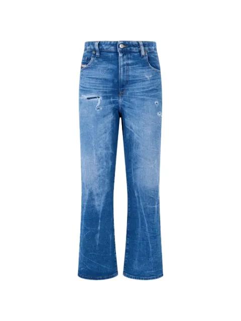 distressed flared-leg jeans by DIESEL