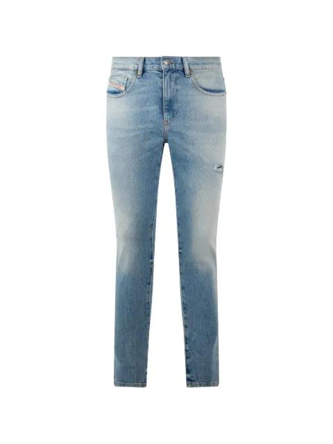 distressed slim-fit jeans by DIESEL