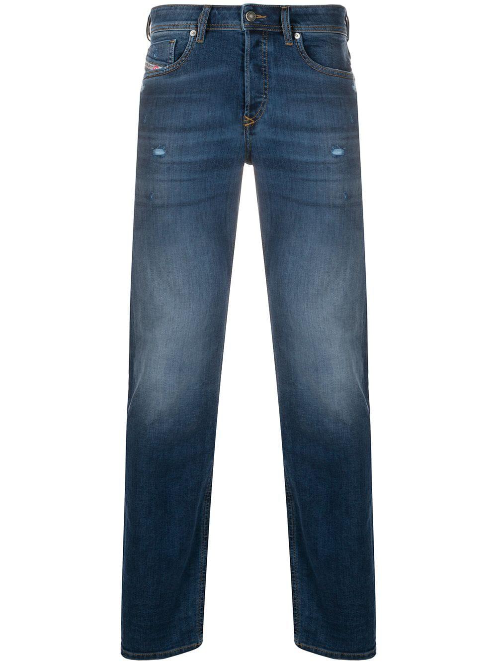 distressed slim-fit jeans by DIESEL