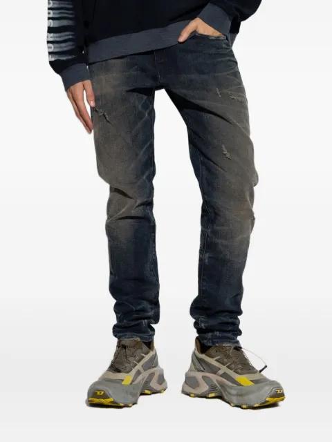 faded distressed jeans by DIESEL