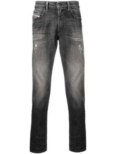 faded-effect distressed jeans by DIESEL