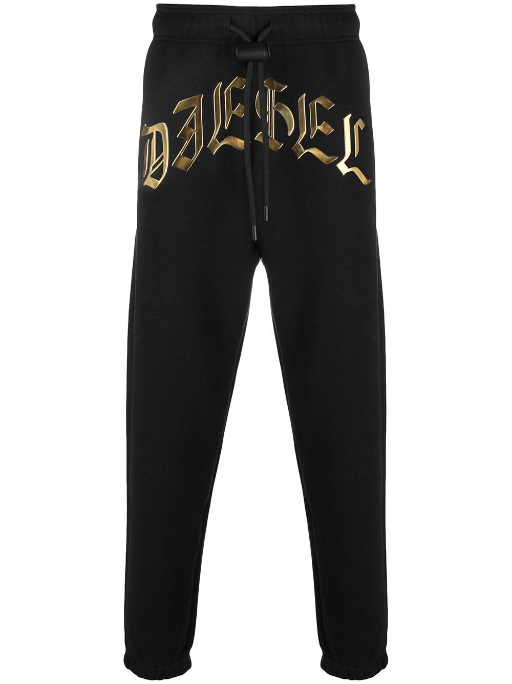 logo-print track trousers by DIESEL