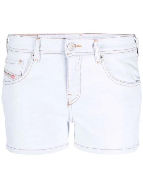 low-rise light-wash shorts by DIESEL