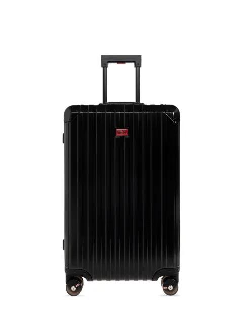ribbed logo-plaque suitcase by DIESEL