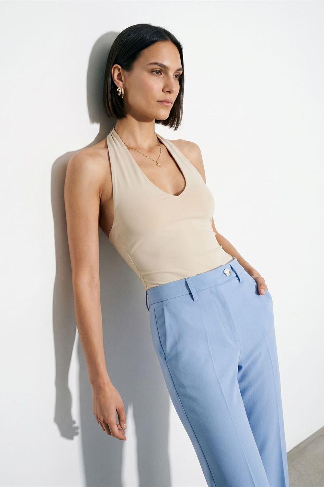 Halter Neck Cut-Out Bodysuit by DILVIN