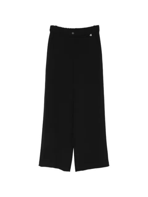 logo-plaque wide-leg trousers by DIXIE