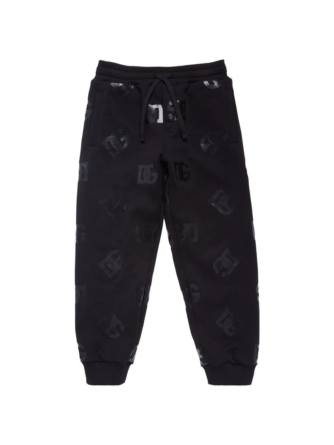 All Over Printed Logo Cotton Sweatpants by DOLCE&GABBANA
