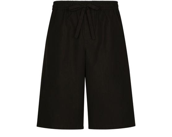 Cotton jogging shorts with logo tag by DOLCE&GABBANA