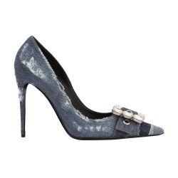 Patchwork denim pumps with rhinestone buckle by DOLCE&GABBANA