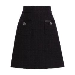 Short skirt with bejeweled buttons by DOLCE&GABBANA