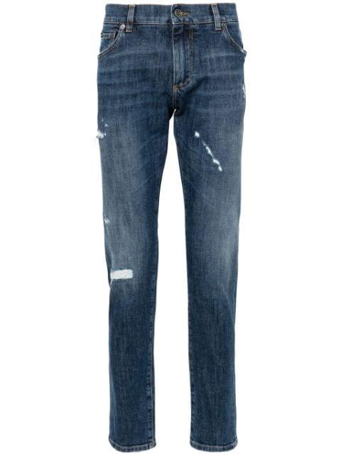 ripped-detail tapered jeans by DOLCE&GABBANA