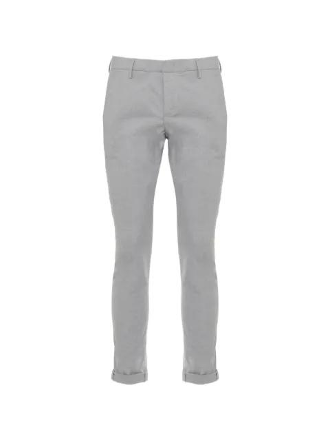 button-detail trousers by DONDUP