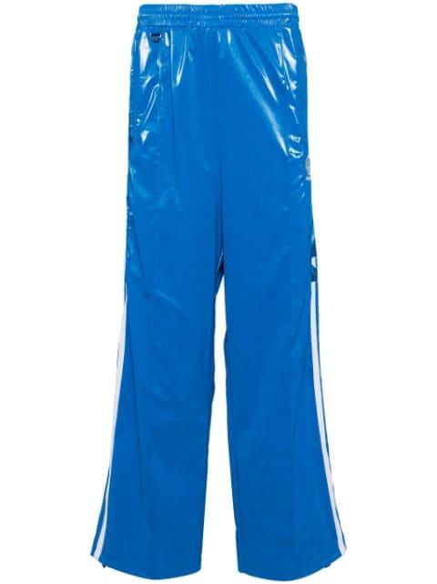 Laminate Track embroidered track pants by DOUBLET