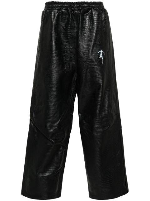 crocodile-pattern leather track pants by DOUBLET