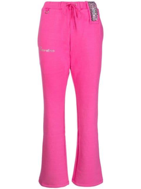 rhinestone-logo detail track pants by DOUBLET