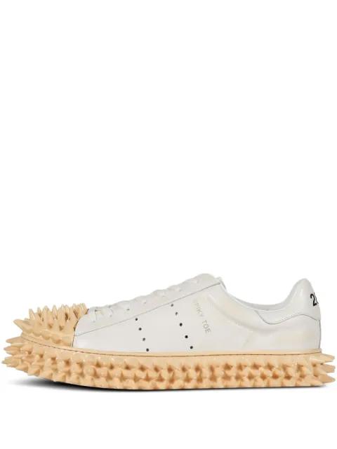 spike-embellished lace-up sneakers by DOUBLET