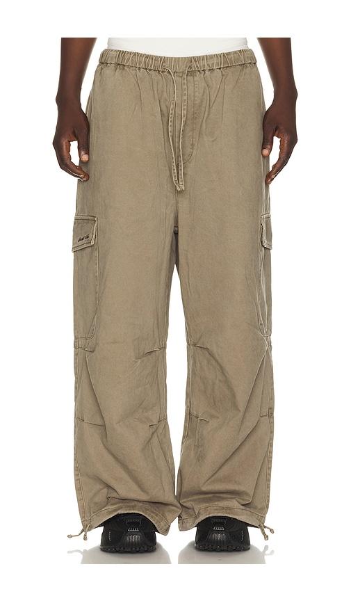 DRMERS CLUB Smiley Logo Parachute Pants in Brown by DRMERS CLUB