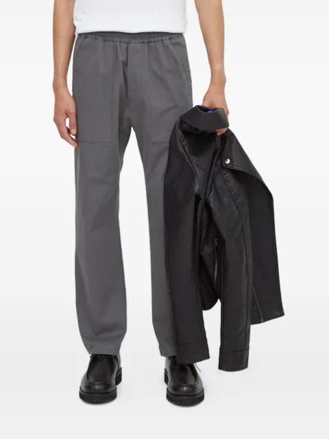 elastic-waist side-pocket trousers by DRYKORN