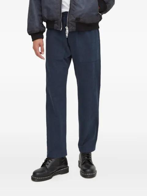 elasticated-waist patch-pocket trousers by DRYKORN