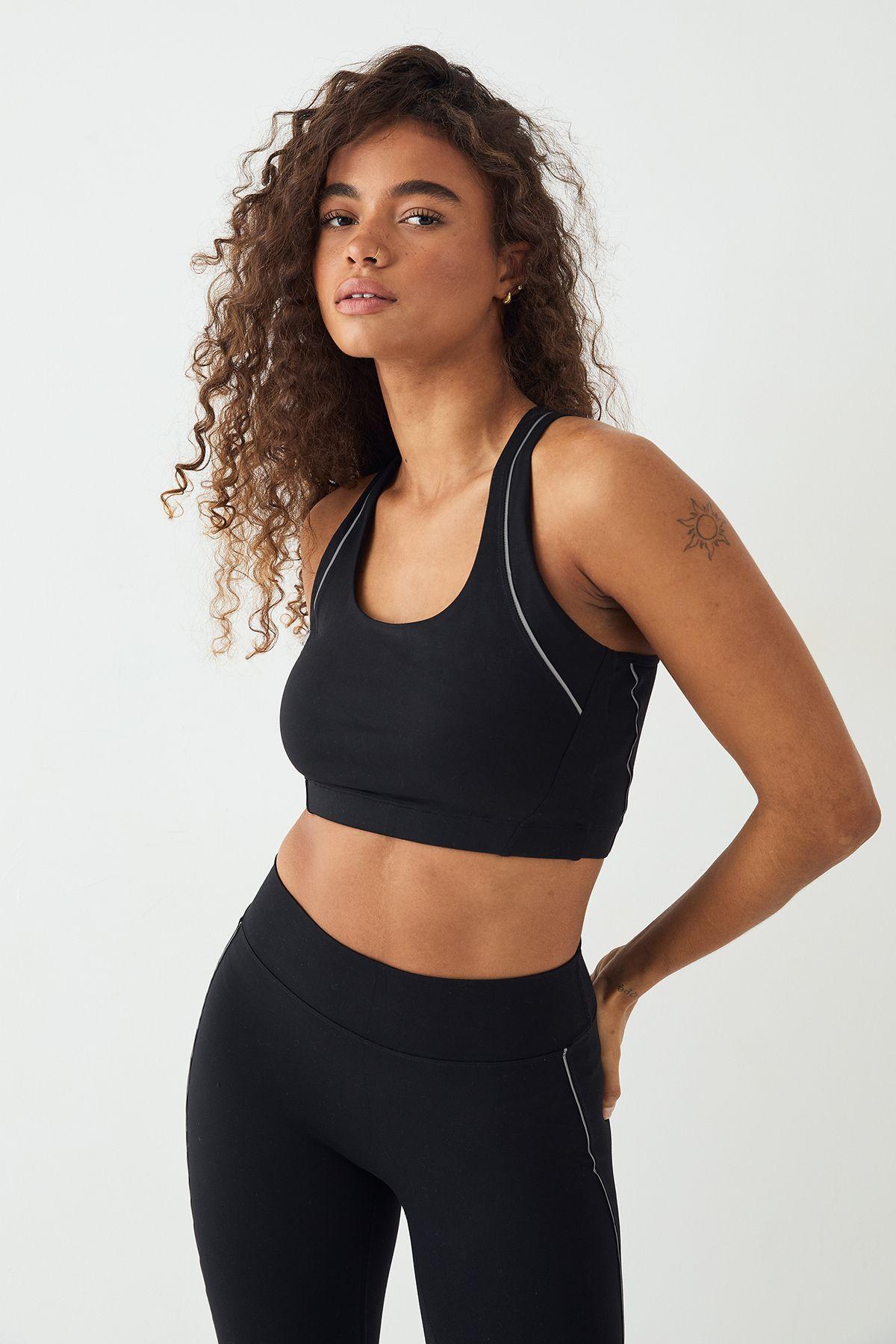 DSGN Studio Reflective Binding Ultra Sculpt Sports Bra by DSGN STUDIO