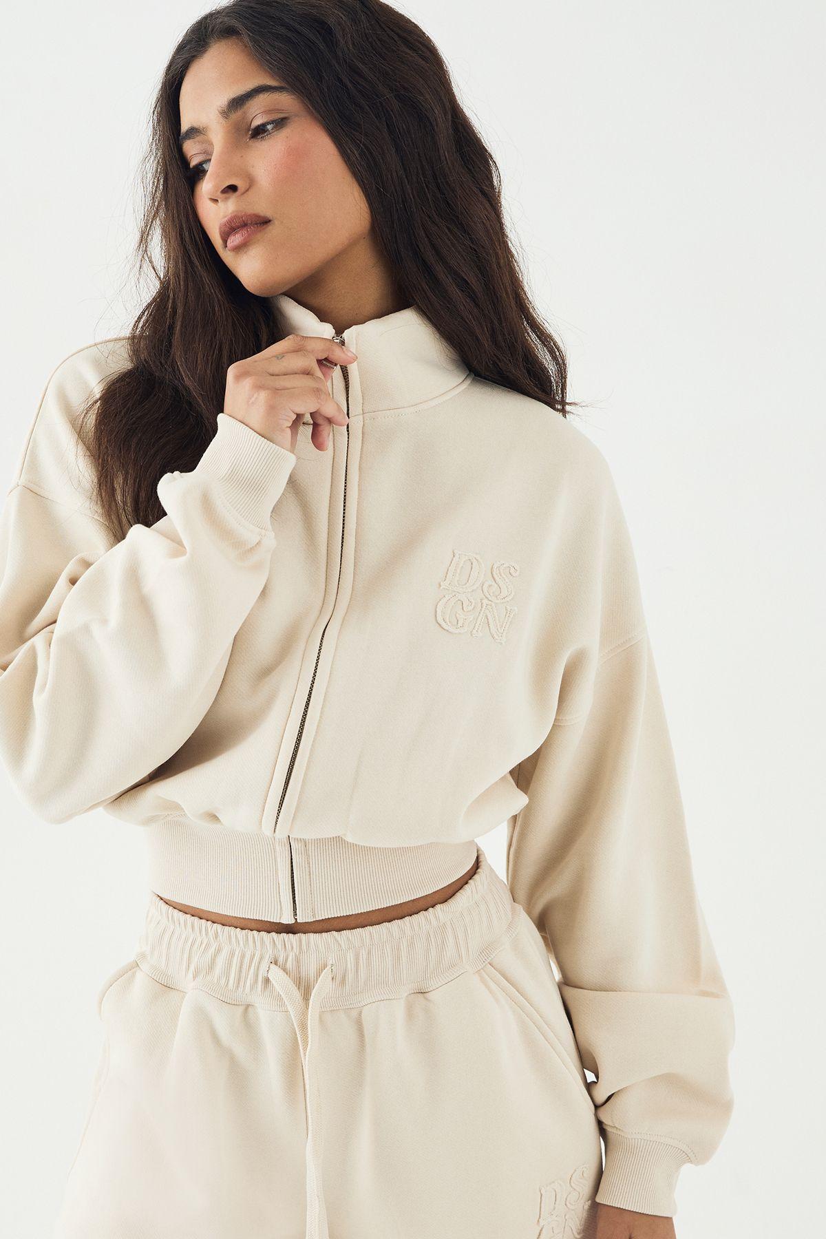DSGN Studio Self Fabric Applique Zip Through Funnel Neck Sweatshirt by DSGN STUDIO