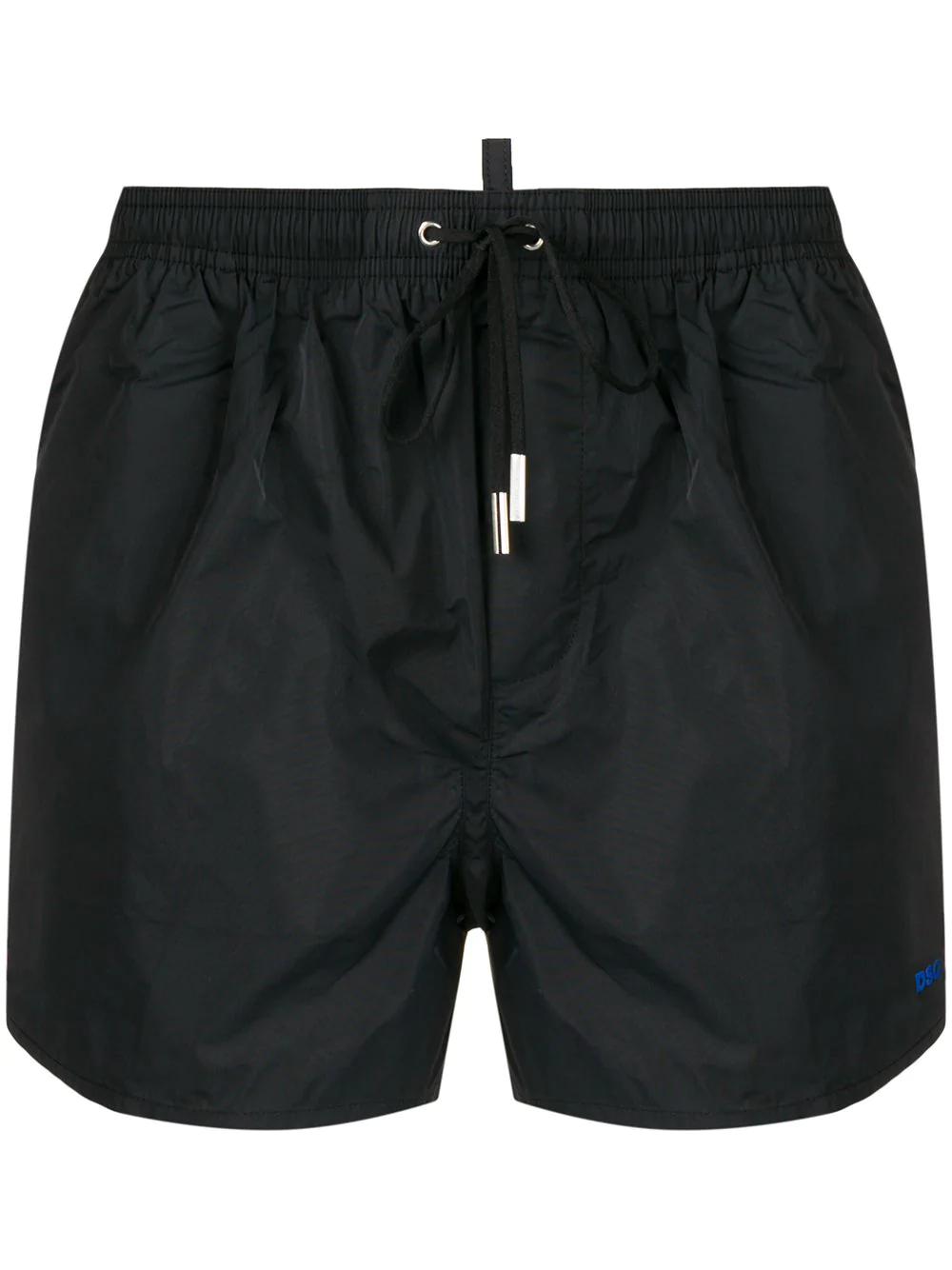 Icon slogan swim shorts by DSQUARED2
