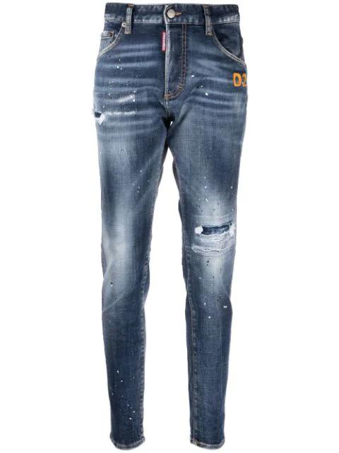 distressed-finish denim jeans by DSQUARED2