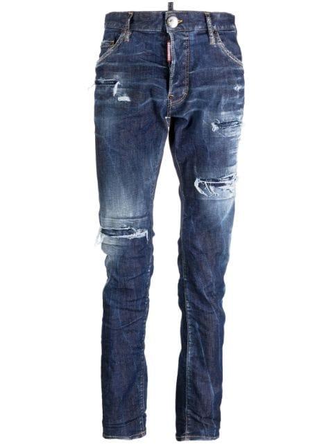 distressed-finish denim jeans by DSQUARED2