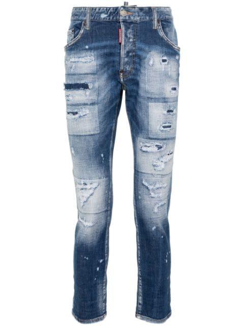 distressed slim-leg jeans by DSQUARED2