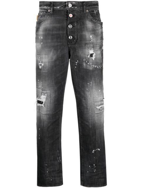 distressed tapered jeans by DSQUARED2