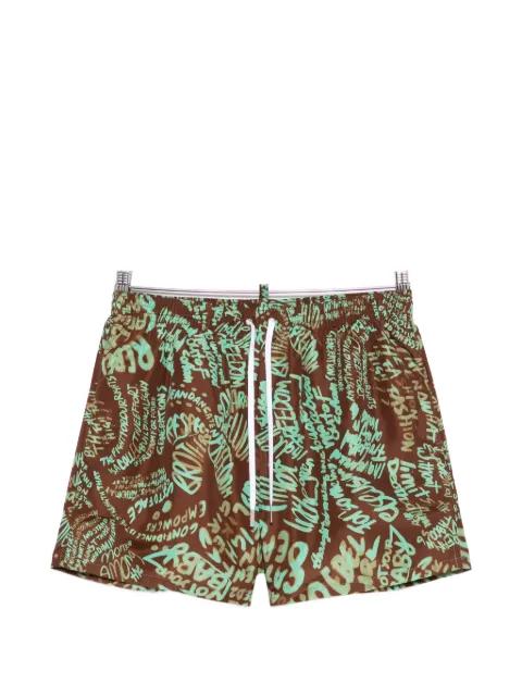 graffiti-print swim shorts by DSQUARED2