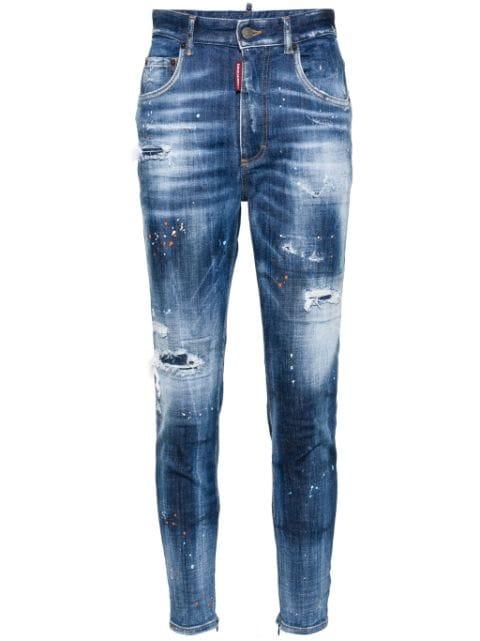 paint-splatter distressed tapered jeans by DSQUARED2