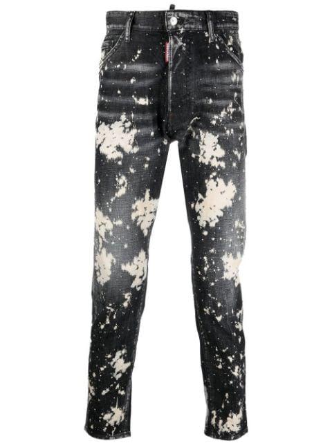 paint splatter-print denim jeans by DSQUARED2