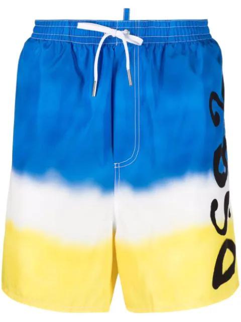 spray-paint print swim shorts by DSQUARED2
