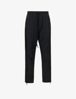 Brand-embroidered tapered-leg shell jogging bottoms by DUE DILIGENCE