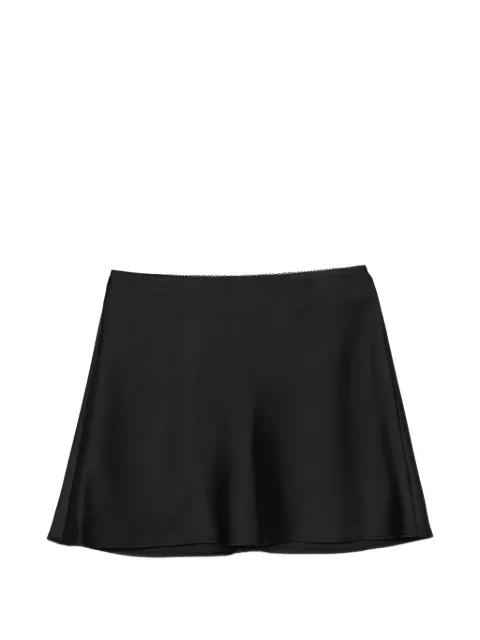 black mini skirt by DUNST