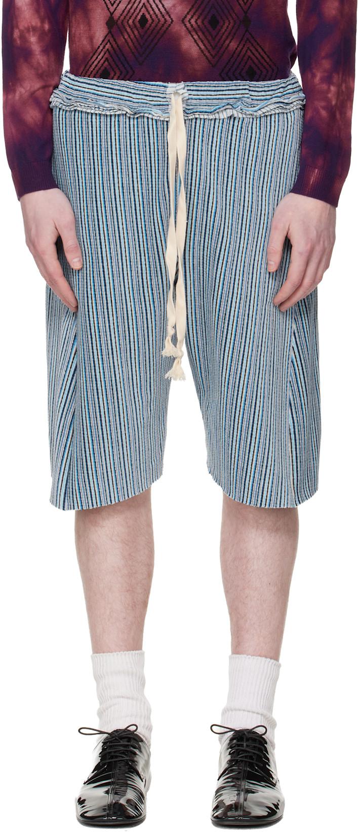 Blue Twisted Track Shorts by EDWARD CUMING