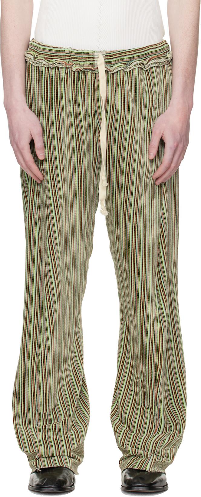 Green Twisted Track Pants by EDWARD CUMING