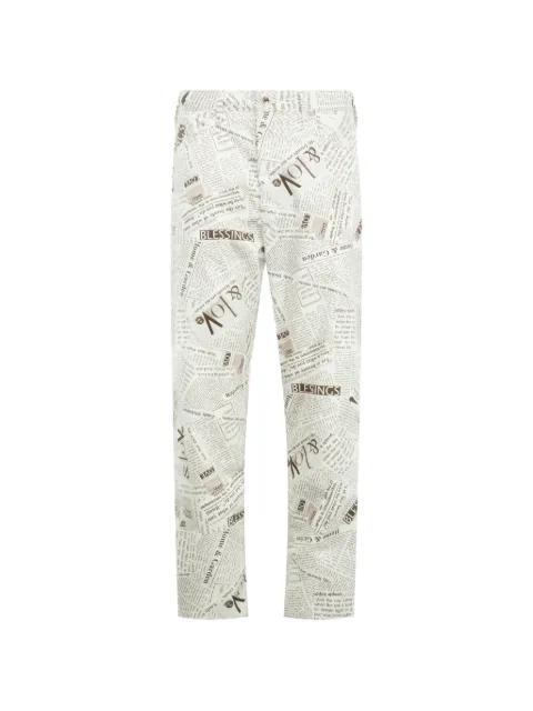 newspaper-print jeans by ENGINEERED GARMENTS