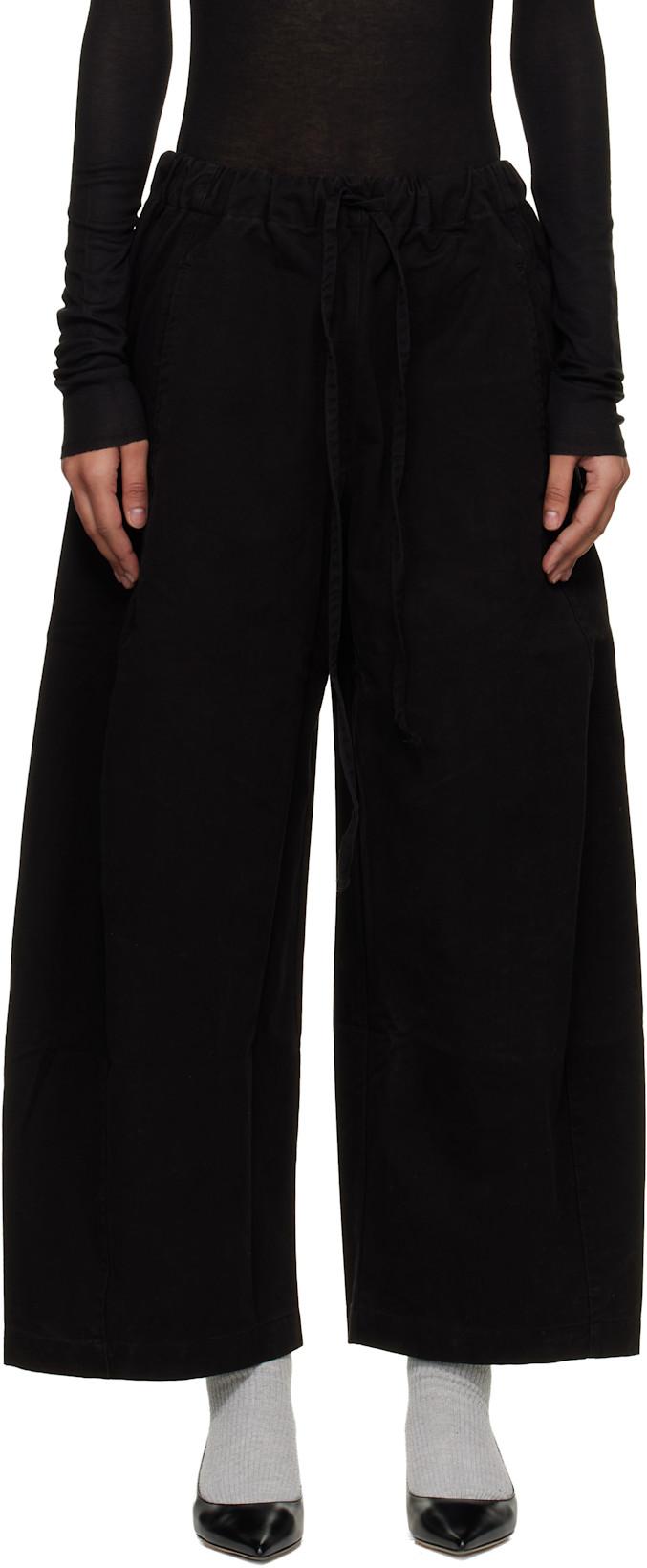 Black Loft Trousers by ENTIRE STUDIOS