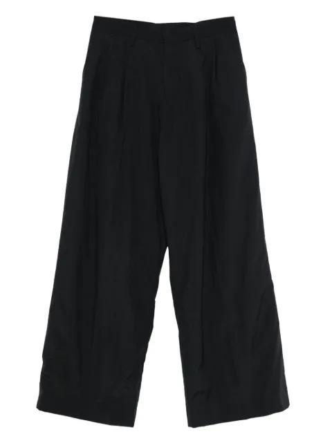 pleated trousers by ERL