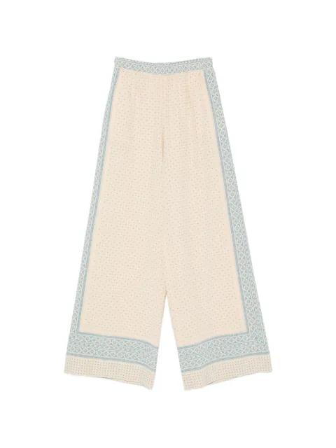 geometric-print palazzo pants by ERMANNO SCERVINO