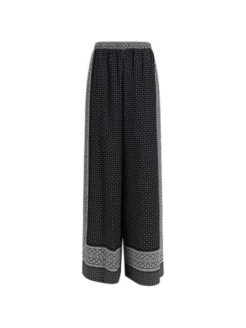 geometric-print palazzo pants by ERMANNO SCERVINO
