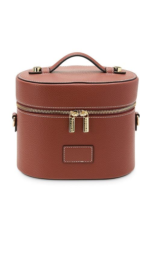 ETOILE COLLECTIVE Oval Toiletry Case in Ginger Brown by ETOILE COLLECTIVE