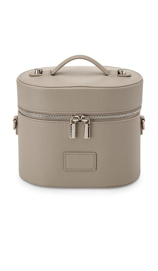 ETOILE COLLECTIVE Oval Toiletry Case in Pebble by ETOILE COLLECTIVE