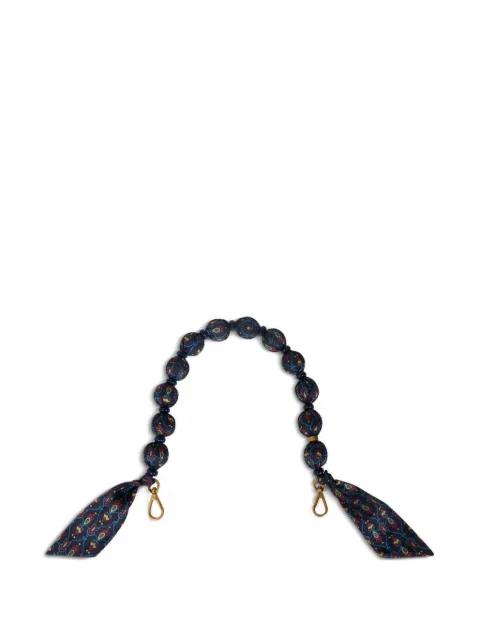 handle with printed fabric spheres and beads by ETRO