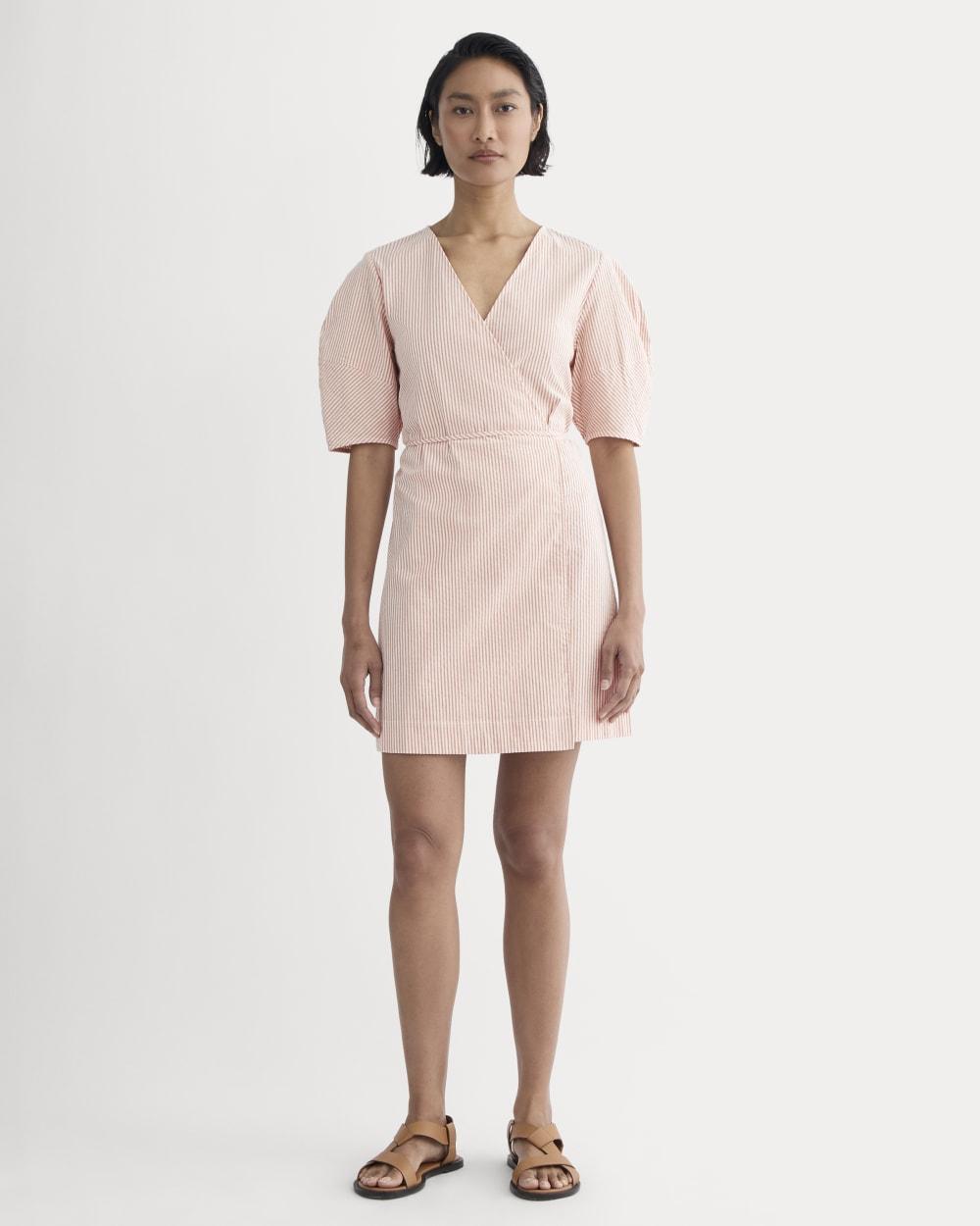 The Seersucker Mini Wrap Dress | Soft Orange by EVERLANE