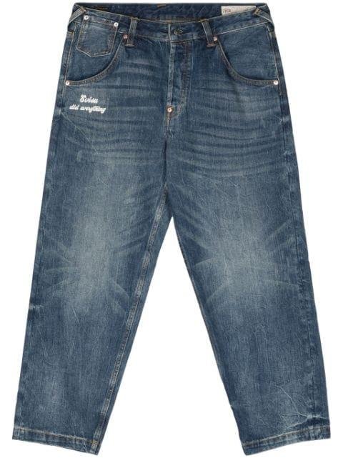 slogan-print tapered-leg jeans by EVISU