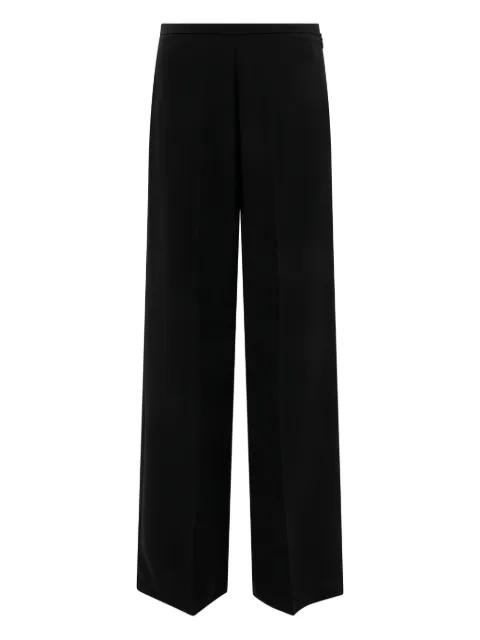 zip-fastening trousers by F.IT