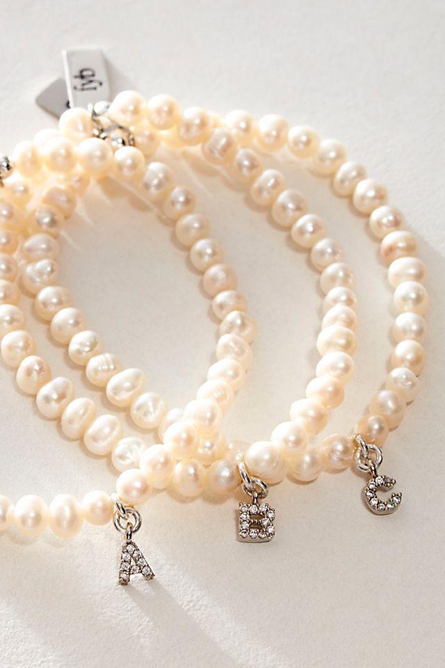 FYB Silver Pearl Identity Bracelet by F YB JEWELRY | FREE PEOPLE